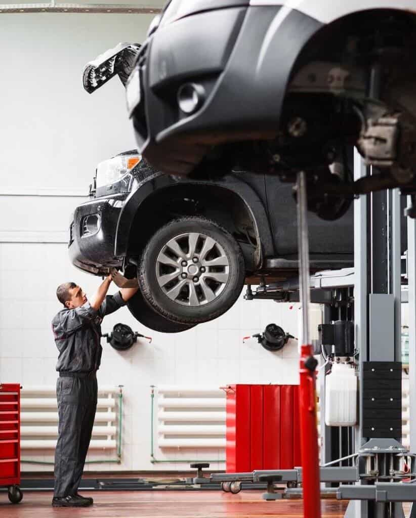 Car being repaired by mechanic