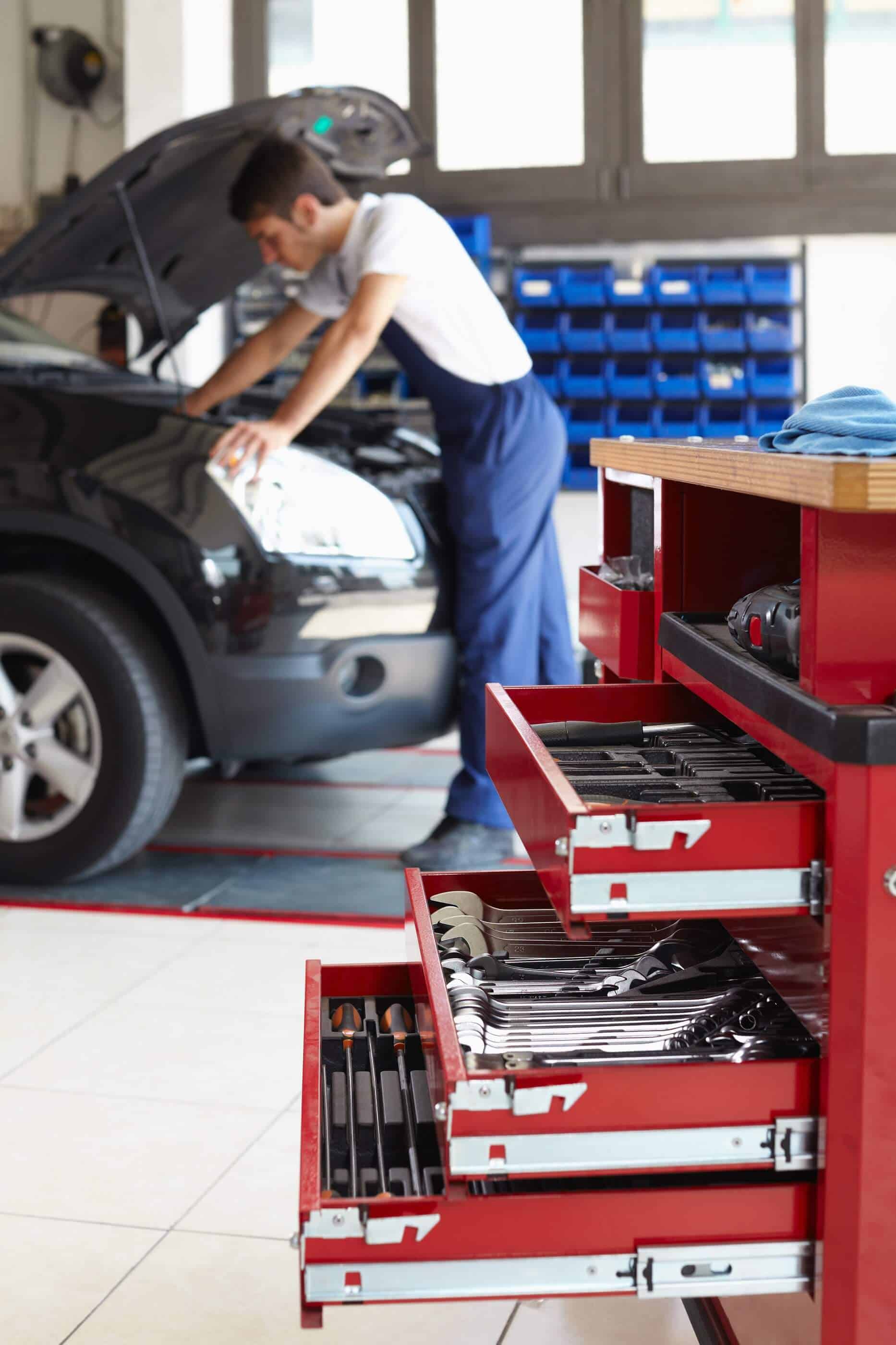 Mechanic working on car