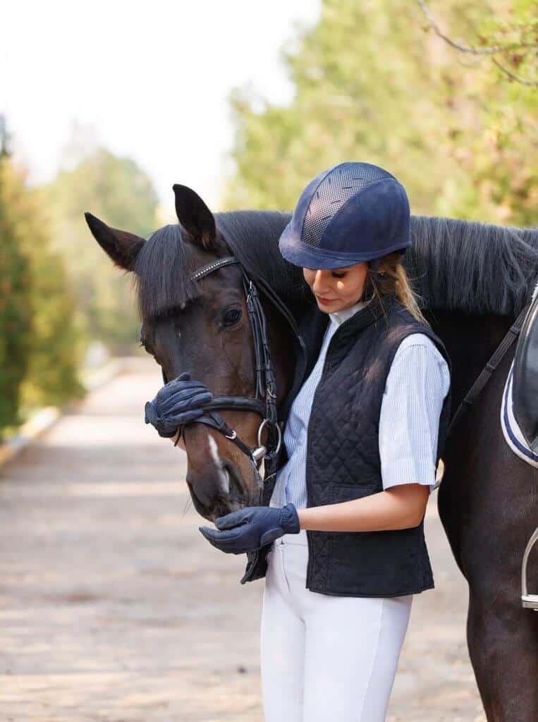 Horse rider with her horse