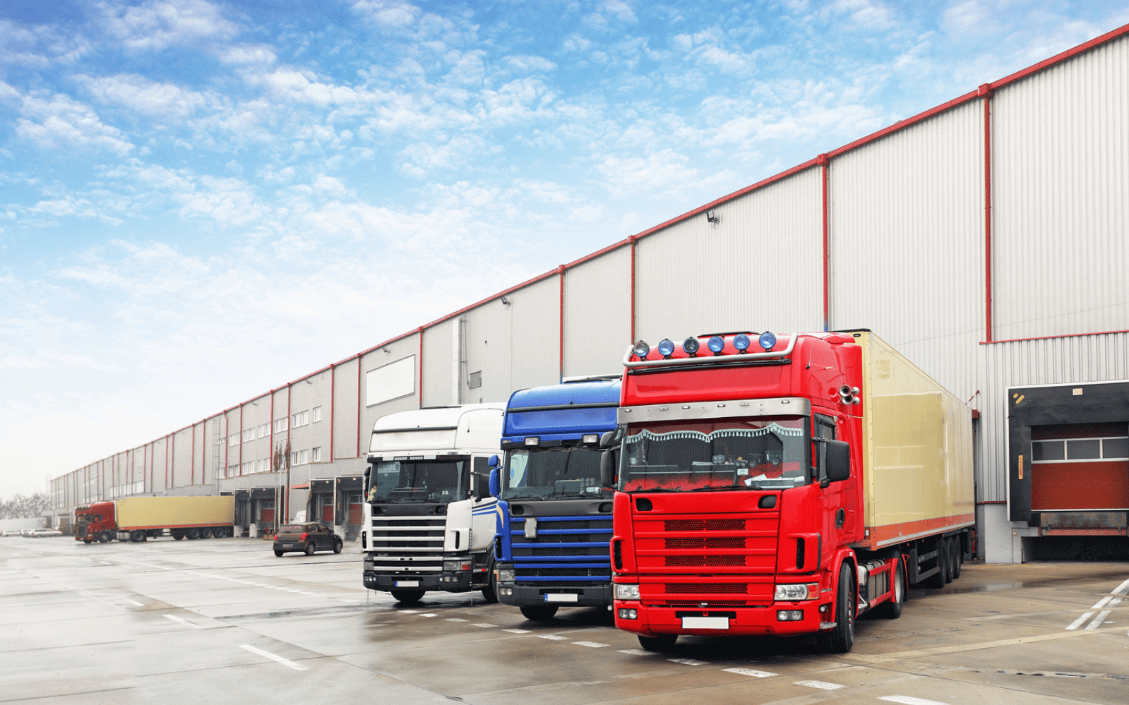 Lorries at warehouse loading bay